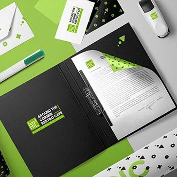 a black folder with a green and white design